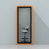 Quell Acoustic Plus Soundproof pod in orange, light blue background, light office workspace